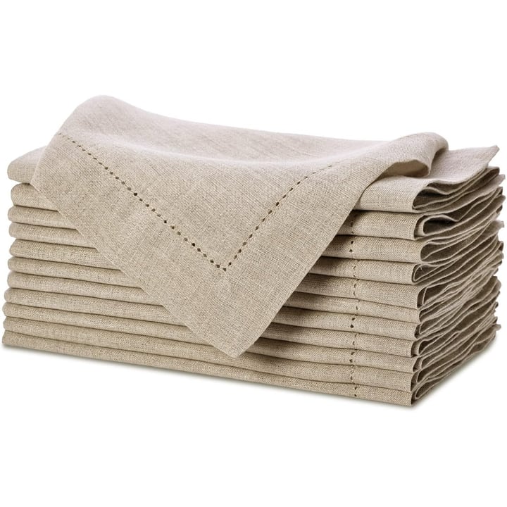 Stack of natural linen napkins with a hemstitch edge